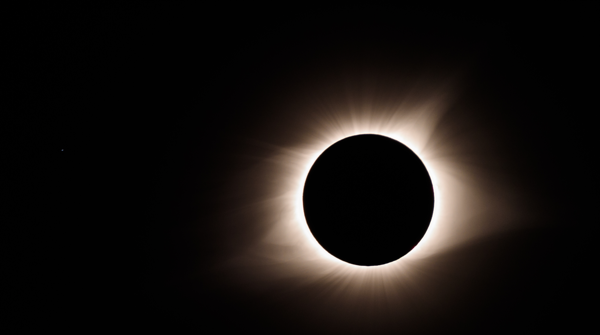 Image of a solar eclipse during totality.